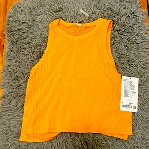 Lululemon train to be tank in clementine